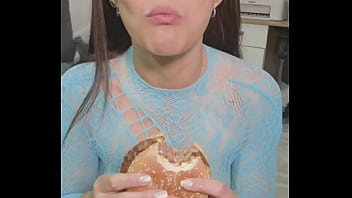 Playing with junk food between my mouth and my hair