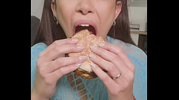 Playing with junk food between my mouth and my hair