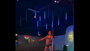 Destiny mae dancing and playing with fire on stage at the strip club