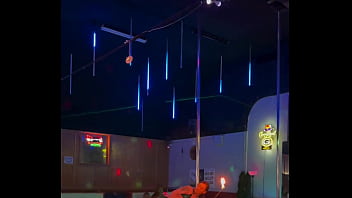 Destiny mae dancing and playing with fire on stage at the strip club