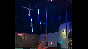 Destiny mae dancing and playing with fire on stage at the strip club