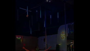 Destiny mae dancing and playing with fire on stage at the strip club