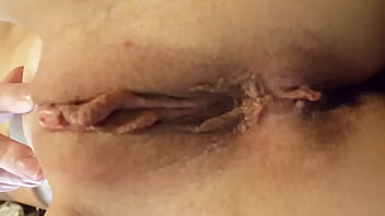 Thin young girlfriend shows her shaved pussy