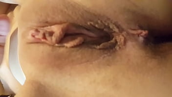 Thin young girlfriend shows her shaved pussy