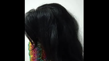 Opening her pussy and inserting a pink dildo she shows her wet pussy