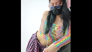 Opening her pussy and inserting a pink dildo she shows her wet pussy