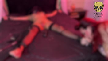 Dominatrix in intense session with her new submissive