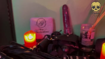 Dominatrix in intense session with her new submissive