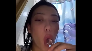 Latina teen deepthroats and drools on dildo