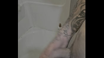 Rubing my cock in and out of the shower