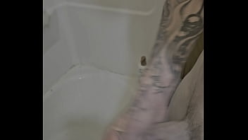 Rubing my cock in and out of the shower