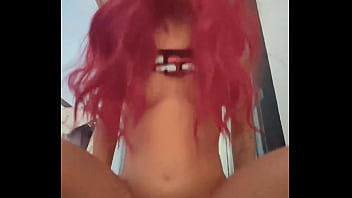 A red haired teen girl in a cowgirl position fucks on a public balcony at dawn and rides a dick