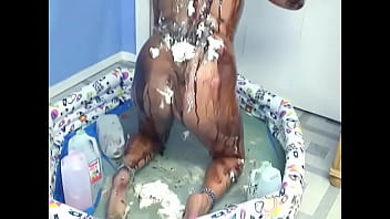 Hot amateur tattooed bitch pours milk and cream on her hot body