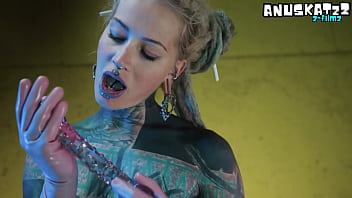 Sexy tattooed girl in latex dp herself with toys