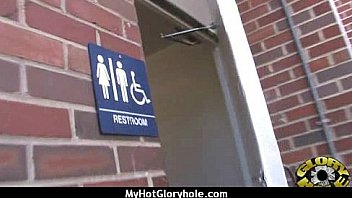 Ebony hottie milking cocks in the gloryhole 2