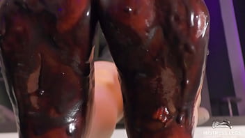 Goddess messy her nylon feet in chocolate close up and squeezing strawberries