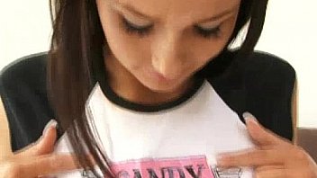 Busty babe get nude while sucking lollipop