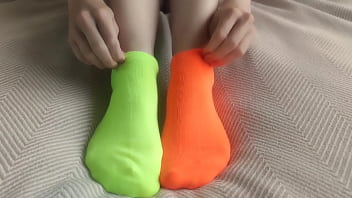 My feet are in colorful mismatched socks for pleasure hot sockjob