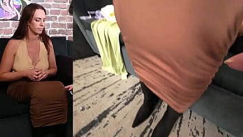 Alisha is trying on a simple zip halter and i take a peek inside