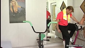 Huge tits redhead mature lady marta m riding indoor training bike while her trainer steve vincent kissing her boobs then he fucking her wet pussy Huge tits redhead mature lady marta m riding indoor training bike while her trainer steve vincent kissing her boobs then he fucking her wet pussy