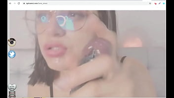 Babe spits on dildo cam