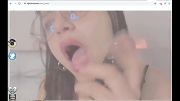 Babe spits on dildo cam