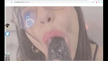 Babe spits on dildo cam