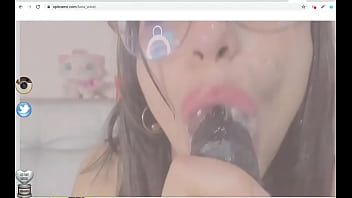 Babe spits on dildo cam