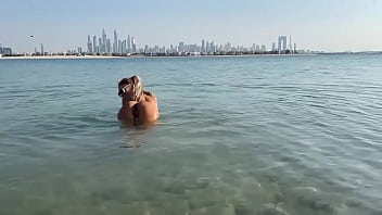 Monika fox swims naked in sea and walks along beach free