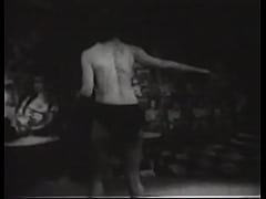 Play MP4 - Lustful brunette with huge jugs strips and dances on the stage of the old circus