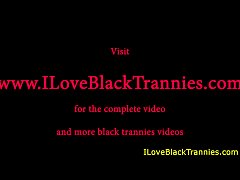 Play MP4 - Black tugging tranny with big boobs on show