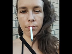 Play MP4 - Kelly Kendricks smokes cigarettes in the sun with lots of cleavage