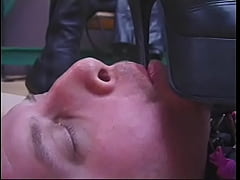 Play MP4 - Leather-clad dominatrixes restrain and punish male slave in BDSM chamber