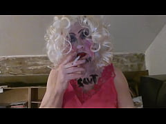 Play MP4 - CD Sissy Sarah Millward knows her ID&comma; as indicated by what's written on her face and chest - 'fag slut' -   as she smokes&comma; wanks her clit&comma; and stuffs a dildo up her nasty lady hole